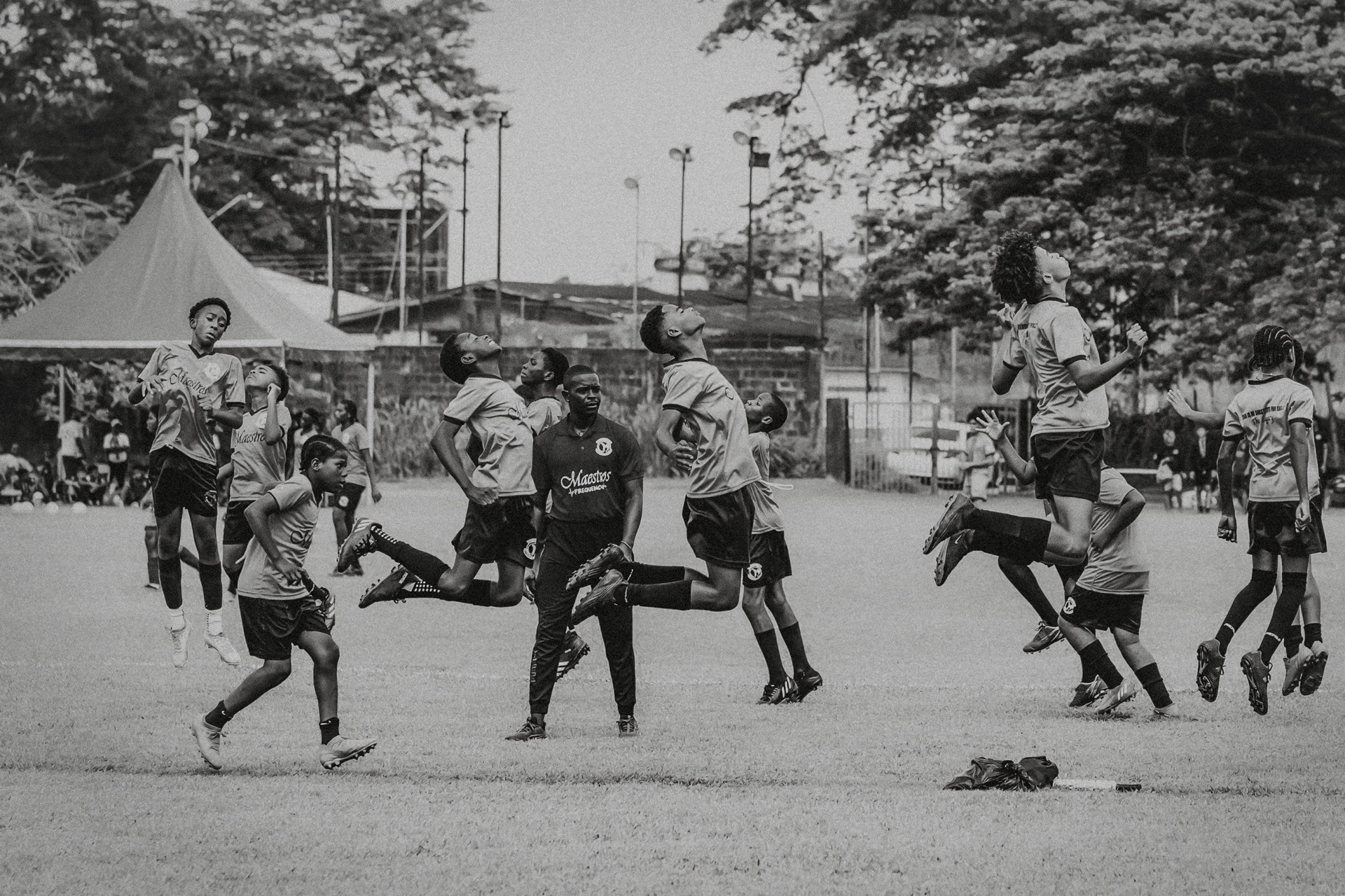 Youth football players competing at TF City League